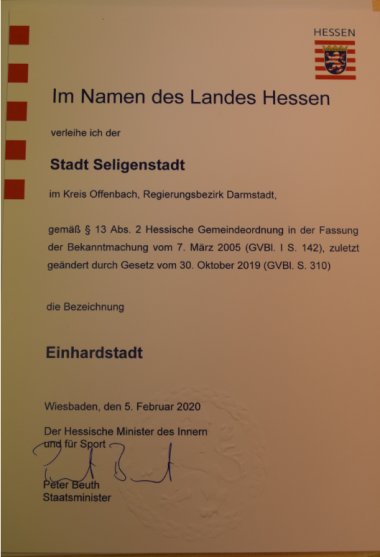 Offizielle Urkunde zur Verleihung des Namenszusatzes "Einhardstadt" Offizielle Urkunde zur Verleihung des Namenszusatzes "Einhardstadt"
