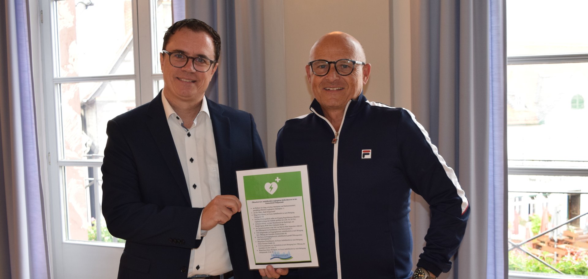 Bürgermeister Dr. Bastian und Allgemeinmediziner Dr. Axel Althen